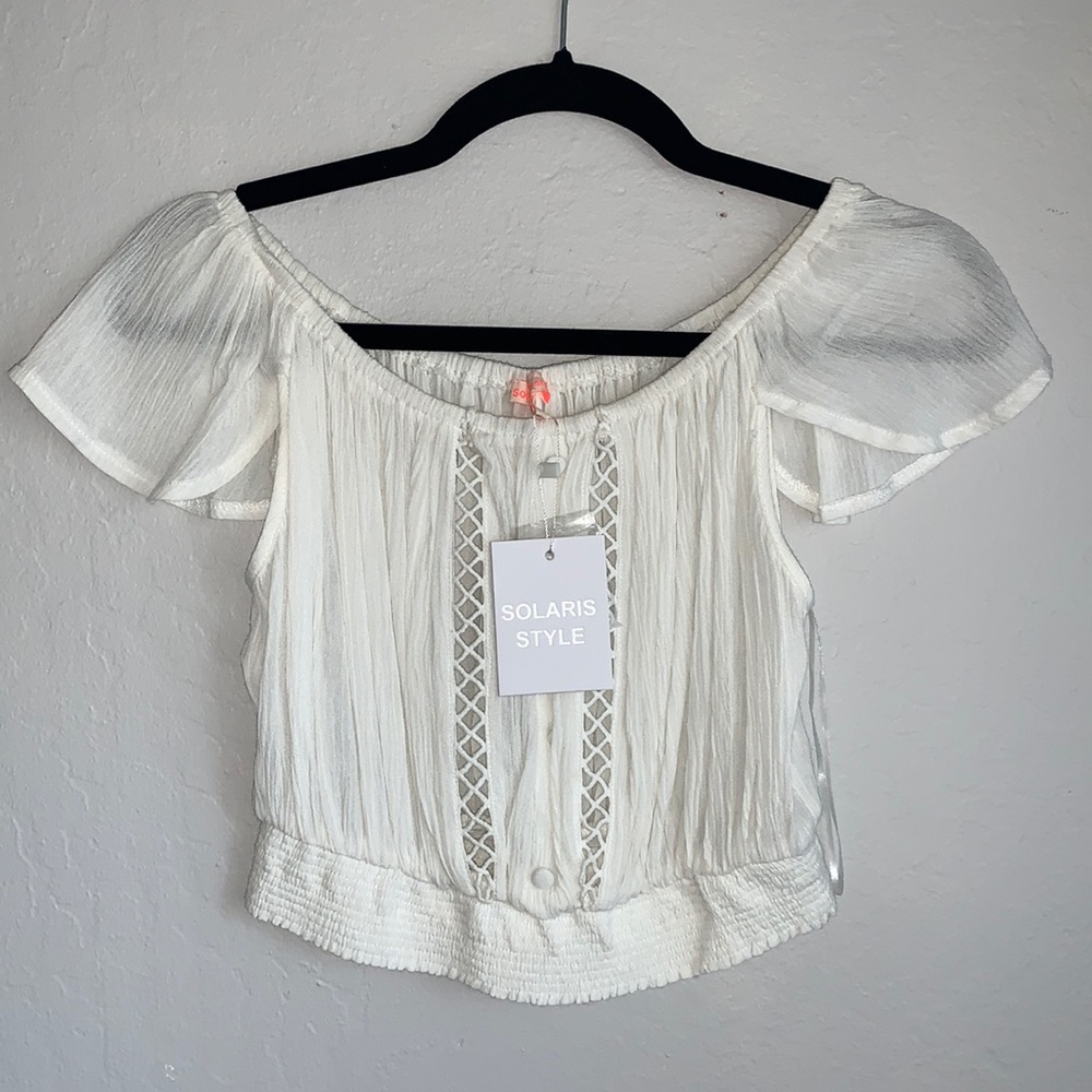 White ruffle crop top